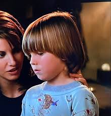 This dates back all the way to the '70s! Adam Rich from Eight is Enough,  Boxey from the original Battlestar Galactica, and even Twiki the robot from  Buck Rogers.