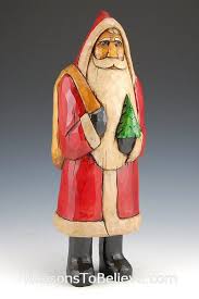 Santa On His Way Santa Claus Figurines And Hand Carved Wooden Santas Santa Carving Wooden Santa Santa Statues