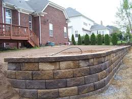 Pavestone 12 retaining wall block, buff, showcases a textured face that is the perfect complement to any landscape design. Retaining Wall Pavestone Block Carolina Blend Color Retaining Wall Cinder Block Walls Cinder Block Wall