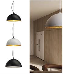 If a chandelier is too grand, go for a simple pendant fixture instead. Dining Room Lights Lighting Styles