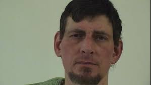 Man arrested after alleged stabbings, theft, police standoff