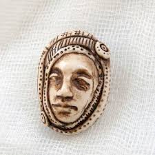 face pendant wrapped