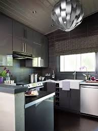 This sleek modern kitchen is designed very beautifully, with the huge industrial metallic lamp adding that wow factor to the setup. 20 Modern Small Kitchen Designs With Pictures In 2021
