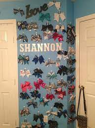 Shannon May S Bow Wall Is Perfection Cheer Bows Cheer Room Decor Cheer Bows Diy