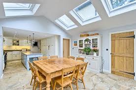 Kitchen extension with bifold doors and vaulted roof with velux. 27 Dining Rooms With Skylights That Steal The Show