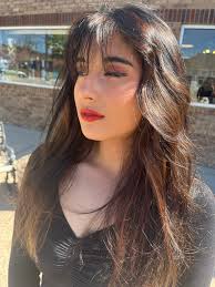 Cassie Cotney asymmetrical hair cut