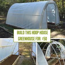 This charming little greenhouse is made from 4 window panels and cut sections from an old hose to clamp the greenhouse plastic to the pvc hoop. How To Build A Hoop House Greenhouse For 50 Off Grid World