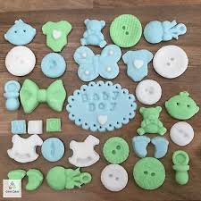This evergreen is covered entirely with edible decorations, like cookies, ribbon candy. 32 Edible Baby Boy Blue Green Christening Shower Cake Cupcake Decorations Topper Ebay