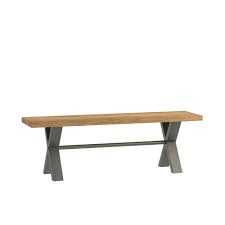 The solid oak hinged top with geometric design resting on raised arms with turned uprights. Bali 140cm Oak Bench Seat Industrial Style At Smiths The Rink