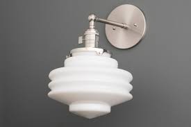 While the ideal height from the floor for a wall sconce depends on the height of your ceilings and size of the fixture, most wall sconces are installed with the center of the fixture between 60 inches and 72 inches. Sconce Model No 5972 Peared Creation