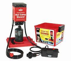 The tank sits on top of the burner, and the water inside it is heated up by the flame. Zodi Hot Tap Travel Shower In 2021 Portable Camping Shower Camping Shower Portable Shower