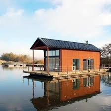 13 Amazing Floating Homes Around The World Floating House Water House Floating Architecture