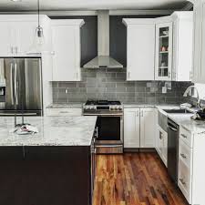 cherry kitchen cabinets with white