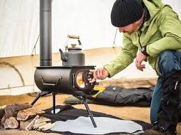 19 Surprisingly Portable Items You Didn T Know You Needed Portable Wood Stove Tent Stove Camping Stove