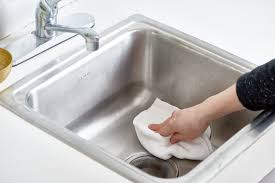 a stainless steel sink with flour