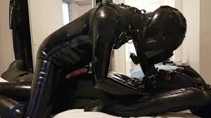 Fastened latex gimp receives an interesting surprise watch online