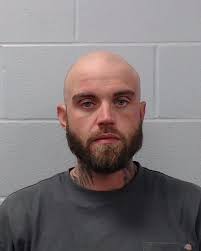 Burklund, Lukas Wayne was booked into the Hays County Jail