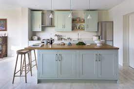 This Gorgeous Classic Kitchen Combines Hand Painted Pastel Blue Cabinetry With Warm Timber For A Homely But Sophisticated Kitchen Design Kitchen Kitchen Sets
