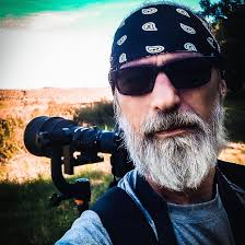 As I sat at the edge of the forest this young black bear came out stood  there looking at me for a few seconds, started walking towards me and about  20 feet