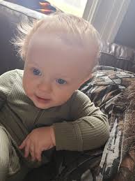 My son Harlan Prine White getting bigger every day! That's us in the first  picture listening to the man he is named after!