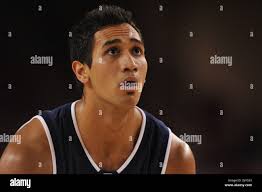 Utah State's Tai Wesley (42) moves the ball as Georgetown's Julian Vaughn  (22) and Georgetown's Hollis Thompson (1) defend during the first half of  an NCAA basketball game Saturday, Dec. 4, 2010,