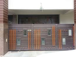 Electric gate on the background of new facade. Home Front Iron Gate Design Home Design Inpirations