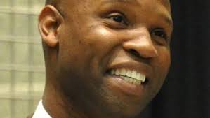 Who should succeed Marty Simmons as Evansville basketball coach?