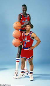 Here's a look at the 7'5'' fall towering over the. Manute Bol Muggsy Bogues Washington Bullets Sports Basketball Funny Basketball Memes Basketball Players