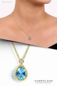 14k Yellow Gold Pear Shape Blue Topaz Pendant Necklace With Bezel Set Diamond Blue Topaz Pendant Necklace Blue Topaz Pendant Bezel Set Diamond