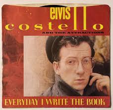 ELVIS COSTELLO EVERYDAY I WRITE BOOK ~ HEATHEN TOWN 7” Vinyl 45 RPM 1983 NM 