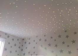 The fiber optic equipment transmits the effect on twinkling stars onto the ceiling making you. Ceiling Twinkle Lights In A Baby Moon And Stars Nursery Theme Design With Metallic Silver Star Wallpaper Star Nursery Star Themed Nursery Themed Kids Room