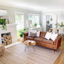 How do you decorate around a brown leather sofa? Brown Living Rooms That Prove It S A Pretty Hue