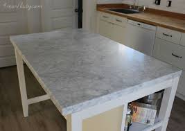 White wrapped concrete ikea kitchen island as seen at ikeahacks.net. Ikea Island Hack 4 Men 1 Lady Ikea Kitchen Island Kitchen Island Ikea Hack Kitchen Renovation
