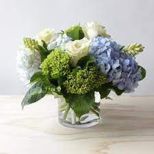 Wedding Flower Decorations Improve Your Wedding Planner S Time By Performing Some Researc Blue Flower Arrangements Hydrangea Arrangements Flower Arrangements