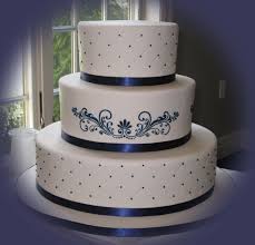 Fit for only a king and his queen is this deep purple royal wedding cake topped with a crown. Simple Royal Blue Midnight Blue Wedding Cake Designs