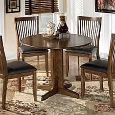 Opt for a side board or a buffet unit to pair with your dining set to store your additional crockery. Dining Room Sclamo S Furniture Millbury Ma