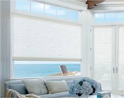 Pick shallow treatments that hang close to the door 1 wood blinds and roller shades are ideal hold down brackets are good for regularly shut shades choose cordless for a sleek look and easy control Choosing The Best Window Treatments For Doors Creative Blinds