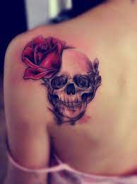 Skull Tattoo Decoated With Red And Black Roses Pretty Skull Tattoos Skull Rose Tattoos Pretty Skull Tattoos For Women