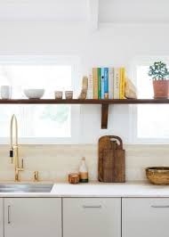 This Montauk Airbnb Features A Very Clever Ikea Hack Tile Trends Ikea Kitchen Cabinets Ikea Kitchen