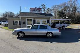 Image result for Light Ice Blue 2010 Town Car