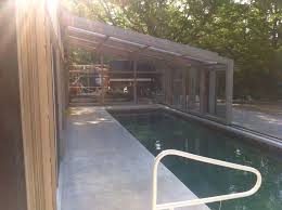 Retracts Off The Pool With A Push Of A Button Endless Pool Pool Cover Retractable Pool Cover