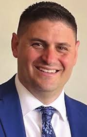 Howell as Beacon Communications publisher