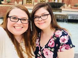 Kirk Herbstreit and Peter walking around the OU campus. They wished us luck  tonight.