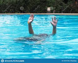 active boy diving and raising hands in