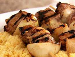 Moroccan Beef Kebabs With Curried Couscous Raita And Charmoula Vinaigrette Recipe Food Network