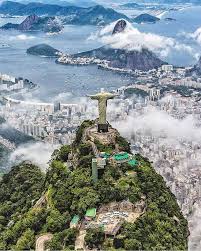 Christ The Redeemer Statue Overlooking Rio De Janeiro Brazil Best Honeymoon Destinations Brazil Travel Travel