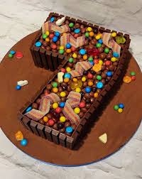 A Number 7 Cake For A 7th Birthday Yummy Chocolate Cake Covered In Chocolate Buttercream Kit Ka 7th Birthday Cakes Tasty Chocolate Cake Number Birthday Cakes