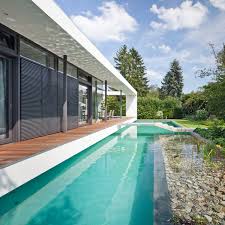 Modern flachdachhaus villa design moderne hausarchitektur moderne hausentwürfe bauhausstil haus moderne hausfassade haus ideen haus bauen. Moderner Pool Am Architektenhaus Mit Brucke Haus 1 Modern Pools Sonstige Von Muto Gmbh Houzz