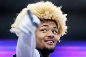 All About Rome Odunze's Parents, Necia Bunnell and James Odunze