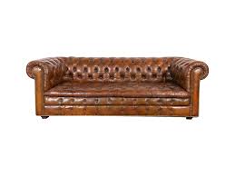 Classic comfortable brown leather sofa with wooden feet. Vintage Chesterfield Sofa For Hire Glasgow Scotland Edinburgh Perthshire